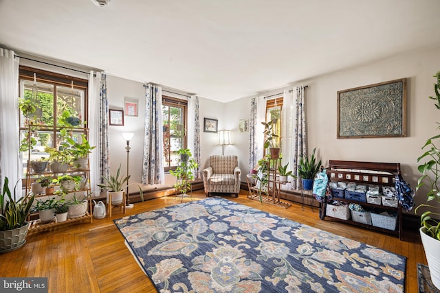 19 W Ave, Woodstown, NJ 08098 - living area with a baseboard radiator and wood finished floors