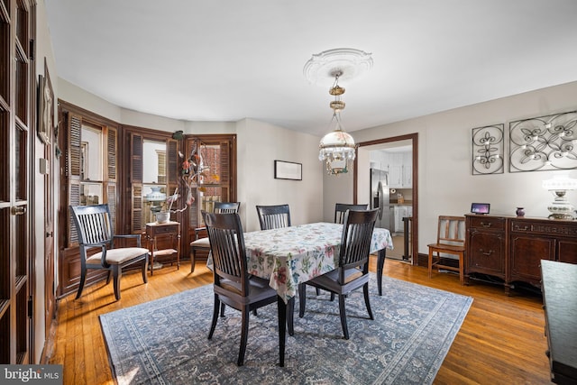 19 W Ave, Woodstown, NJ 08098 - dining area with a chandelier and wood finished floors