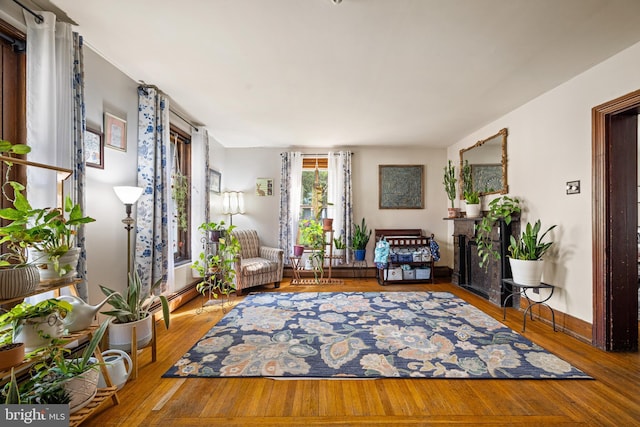 19 W Ave, Woodstown, NJ 08098 - living area featuring wood finished floors and a baseboard radiator