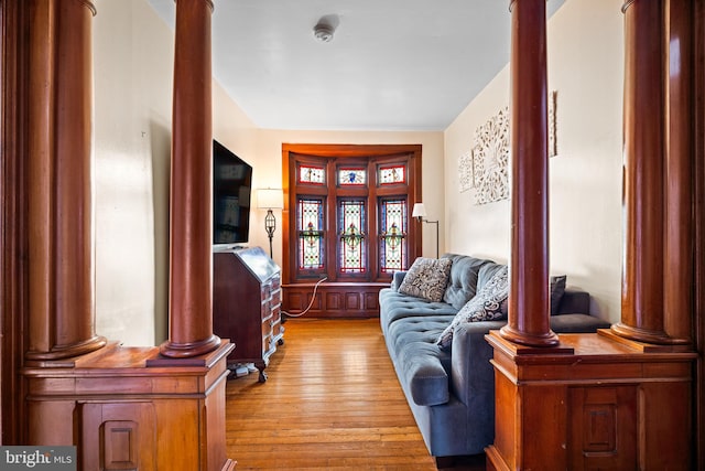 19 W Ave, Woodstown, NJ 08098 - living room with light wood-type flooring and ornate columns