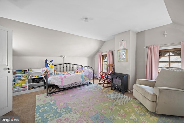 19 W Ave, Woodstown, NJ 08098 - bedroom featuring carpet flooring, lofted ceiling, and a wood stove