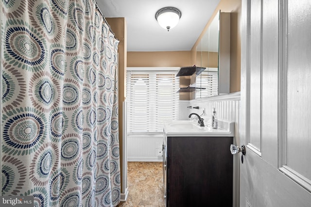 19 W Ave, Woodstown, NJ 08098 - bathroom featuring vanity, a shower with curtain, and wainscoting