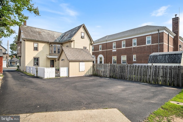 19 W Ave, Woodstown, NJ 08098 - view of home's exterior with a chimney