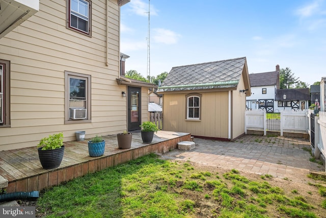 19 W Ave, Woodstown, NJ 08098 - view of yard featuring a wooden deck, an outdoor structure, a patio area, and cooling unit