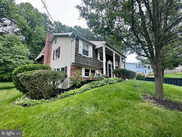 304 Blackburn Ct, Joppa, MD 21085 - view of front of property featuring a chimney and a front yard