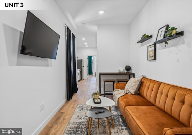 1150 S 52nd St, Philadelphia, PA 19143 - living room featuring light wood-type flooring, recessed lighting, and baseboards