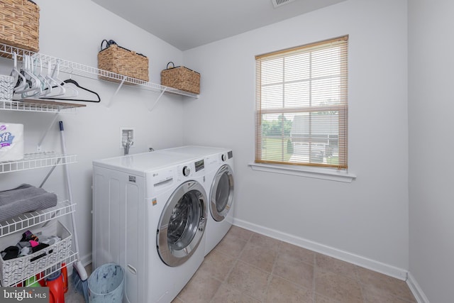 7 Schooner, Carneys Point, NJ 08069 - laundry room featuring washing machine and dryer and healthy amount of natural light