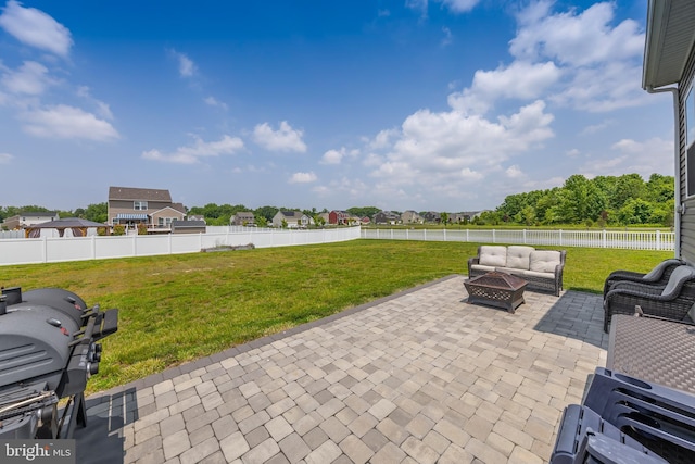 7 Schooner, Carneys Point, NJ 08069 - fenced backyard featuring an outdoor living space with a fire pit and a patio area
