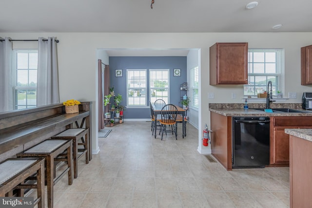 7 Schooner, Carneys Point, NJ 08069 - kitchen with black dishwasher and brown cabinetry