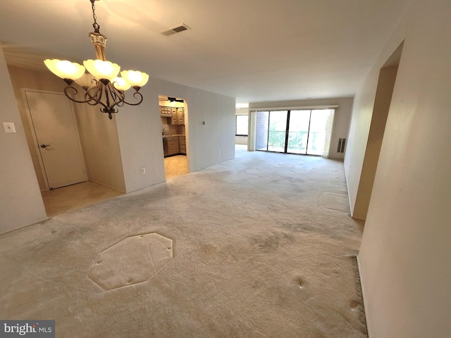 5100 Convent Ln Unit 412, Philadelphia, PA 19114 - unfurnished room featuring a chandelier and light carpet