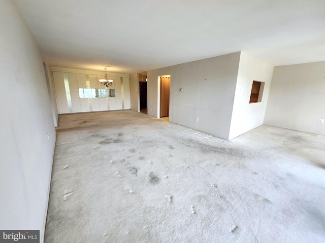 5100 Convent Ln Unit 412, Philadelphia, PA 19114 - unfurnished living room with a chandelier and light carpet