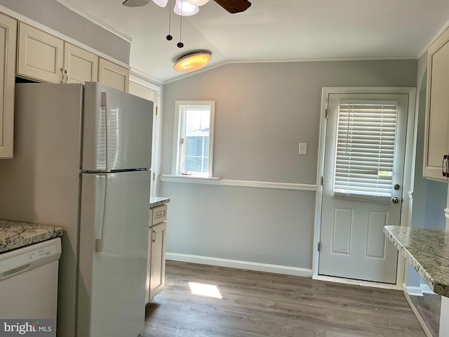 647 Elm St, Aberdeen, MD 21001 - kitchen with white appliances, ceiling fan, wood finished floors, vaulted ceiling, and light stone counters