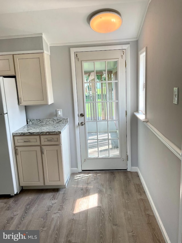 647 Elm St, Aberdeen, MD 21001 - entryway with light wood-type flooring and crown molding