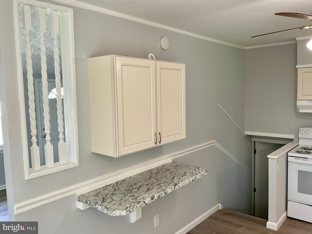 647 Elm St, Aberdeen, MD 21001 - kitchen featuring white range with electric stovetop, a ceiling fan, exhaust hood, dark wood-style flooring, and crown molding