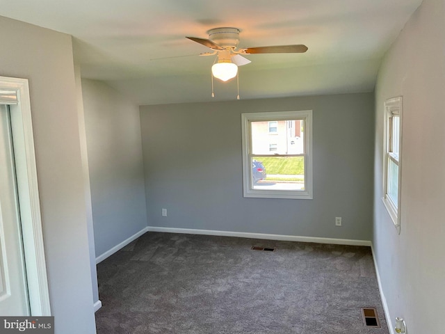 647 Elm St, Aberdeen, MD 21001 - unfurnished room featuring dark carpet and ceiling fan