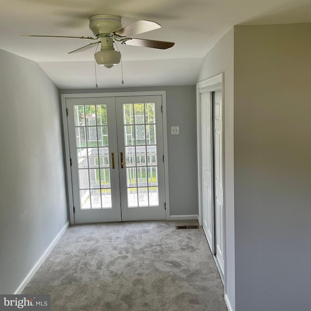 647 Elm St, Aberdeen, MD 21001 - doorway featuring vaulted ceiling, french doors, carpet, and a ceiling fan