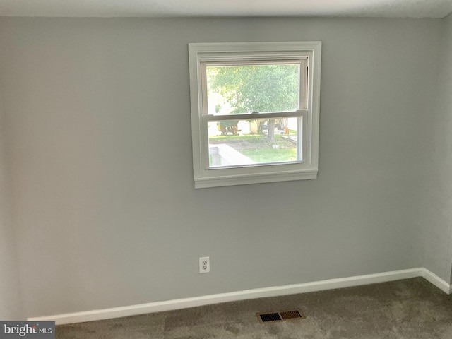 647 Elm St, Aberdeen, MD 21001 - spare room featuring baseboards and carpet flooring