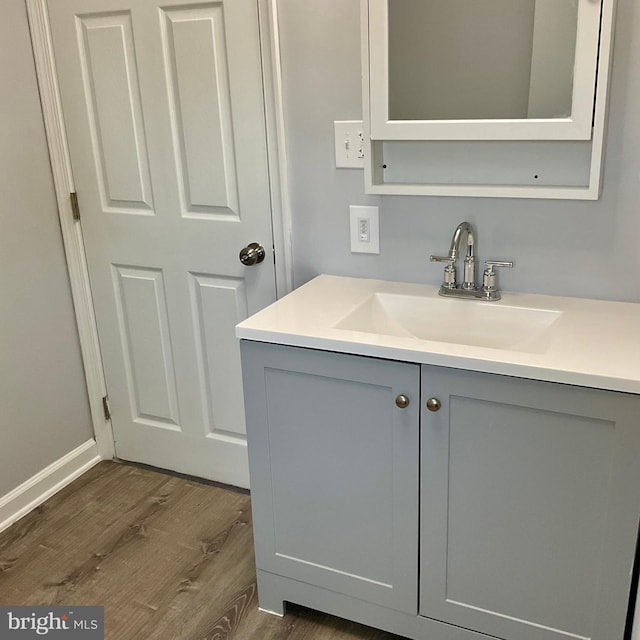 647 Elm St, Aberdeen, MD 21001 - bathroom with wood finished floors and vanity