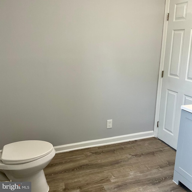 647 Elm St, Aberdeen, MD 21001 - bathroom featuring wood finished floors and toilet