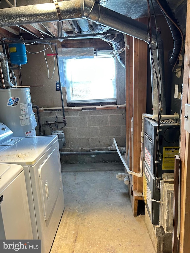 647 Elm St, Aberdeen, MD 21001 - below grade area with water heater, independent washer and dryer, concrete block wall, and heating unit