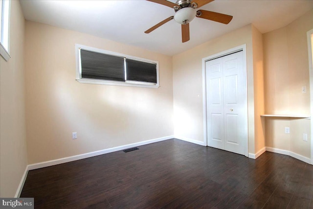 113 Wilgate Rd, Owings Mills, MD 21117 - unfurnished bedroom featuring dark wood-style floors, baseboards, and a closet