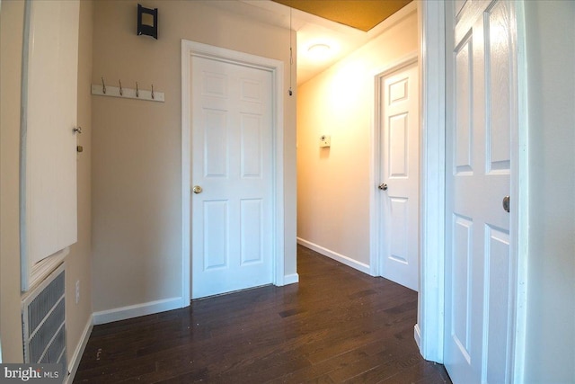 113 Wilgate Rd, Owings Mills, MD 21117 - hall featuring dark wood-style flooring and baseboards
