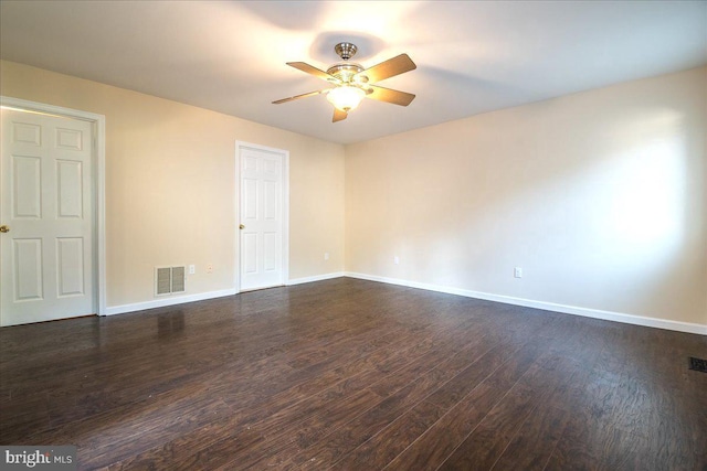 113 Wilgate Rd, Owings Mills, MD 21117 - spare room with dark wood-style flooring, a ceiling fan, and baseboards