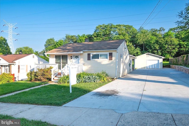 113 Wilgate Rd, Owings Mills, MD 21117 - view of front of house with a detached garage, an outdoor structure, and a front lawn