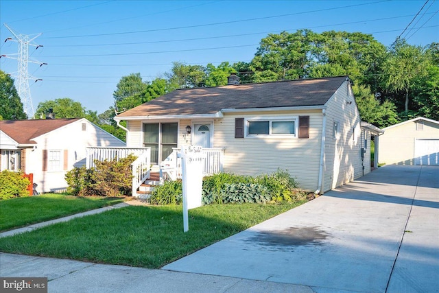 113 Wilgate Rd, Owings Mills, MD 21117 - bungalow-style house featuring an outdoor structure, a front yard, and a chimney