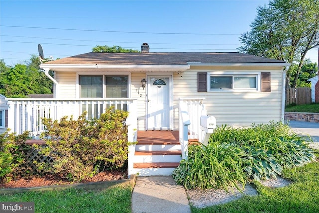 113 Wilgate Rd, Owings Mills, MD 21117 - view of front of house featuring a chimney