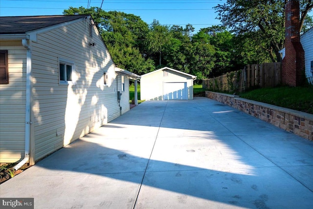 113 Wilgate Rd, Owings Mills, MD 21117 - view of home's exterior featuring a garage and an outdoor structure