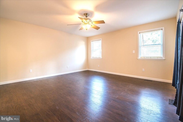 113 Wilgate Rd, Owings Mills, MD 21117 - unfurnished room with ceiling fan, dark wood-style flooring, and baseboards