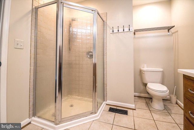 113 Wilgate Rd, Owings Mills, MD 21117 - bathroom with toilet, vanity, a shower stall, and tile patterned flooring