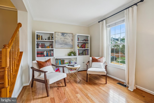 7484 Gadsby Sq, Alexandria, VA 22315 - living area with hardwood / wood-style floors, baseboards, and crown molding