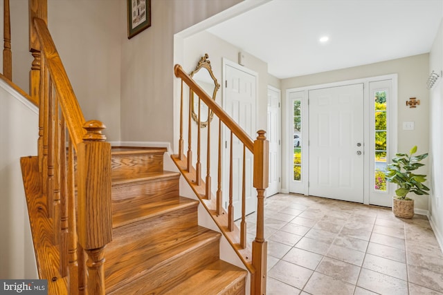 7484 Gadsby Sq, Alexandria, VA 22315 - foyer featuring stairway, baseboards, recessed lighting, and light tile patterned floors