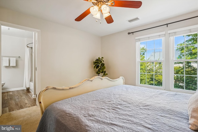 7484 Gadsby Sq, Alexandria, VA 22315 - bedroom with wood finished floors, ceiling fan, and baseboards