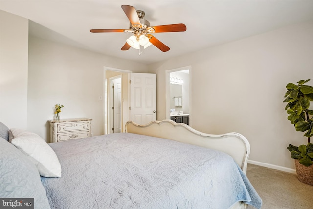 7484 Gadsby Sq, Alexandria, VA 22315 - bedroom featuring carpet floors, baseboards, ensuite bath, ceiling fan, and a sink