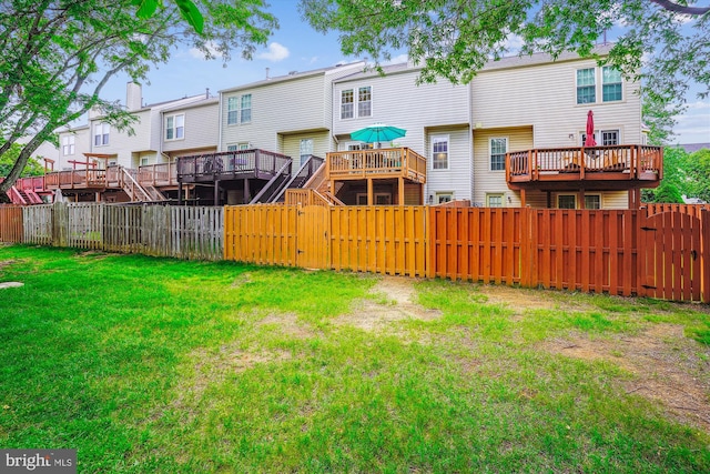7484 Gadsby Sq, Alexandria, VA 22315 - view of yard with a gate and a wooden deck