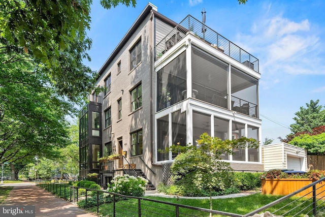 1401 S Carolina Ave SE Unit 1, Washington, DC 20003 - view of side of home with a sunroom and a balcony