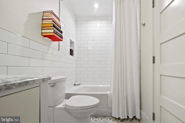 1401 S Carolina Ave SE Unit 1, Washington, DC 20003 - full bathroom featuring tile walls, shower / bath combo, vanity, and recessed lighting