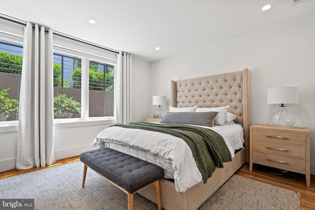 1401 S Carolina Ave SE Unit 1, Washington, DC 20003 - bedroom with multiple windows, recessed lighting, and wood finished floors