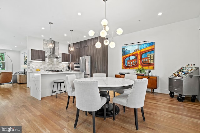 1401 S Carolina Ave SE Unit 1, Washington, DC 20003 - dining area featuring light wood-style floors and recessed lighting