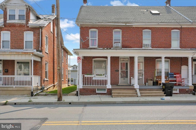 121 N Franklin St, Fleetwood, PA 19522 - multi unit property featuring a porch and brick siding