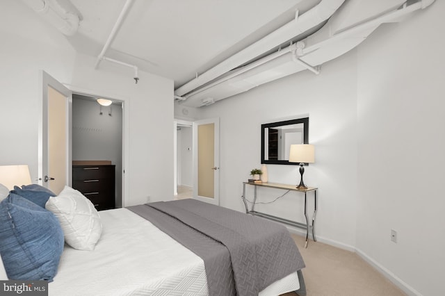 2311 M St NW Unit Ph-1007, Washington, DC 20037 - bedroom with carpet and baseboards
