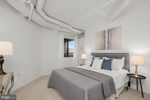 2311 M St NW Unit Ph-1007, Washington, DC 20037 - bedroom featuring carpet floors and baseboards