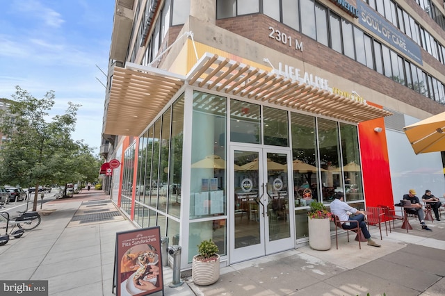 2311 M St NW Unit Ph-1007, Washington, DC 20037 - property entrance featuring a pergola