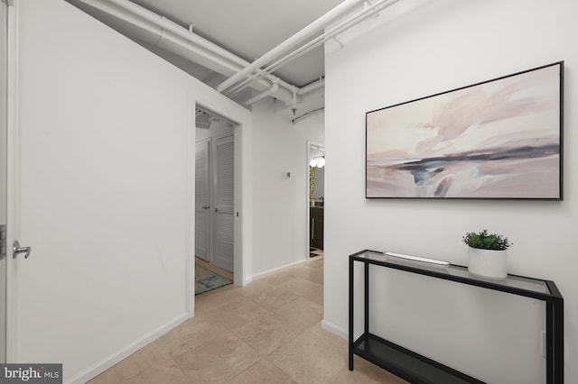 2311 M St NW Unit Ph-1007, Washington, DC 20037 - corridor with baseboards and light tile patterned floors