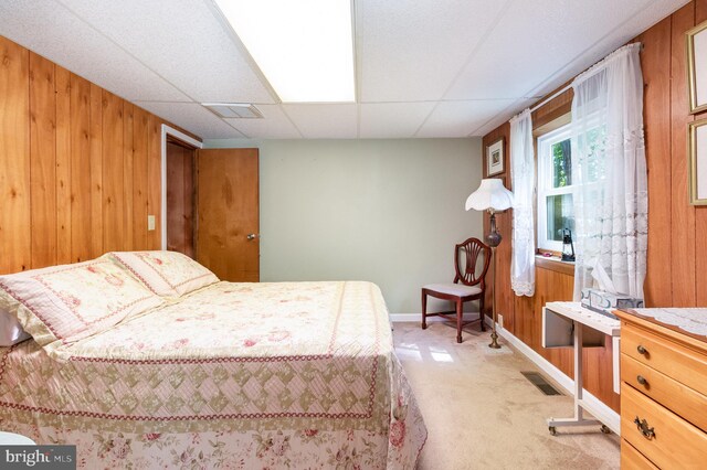 1214 Minnich Rd, Mechanicsburg, PA 17055 - bedroom featuring wooden walls, light carpet, and a paneled ceiling