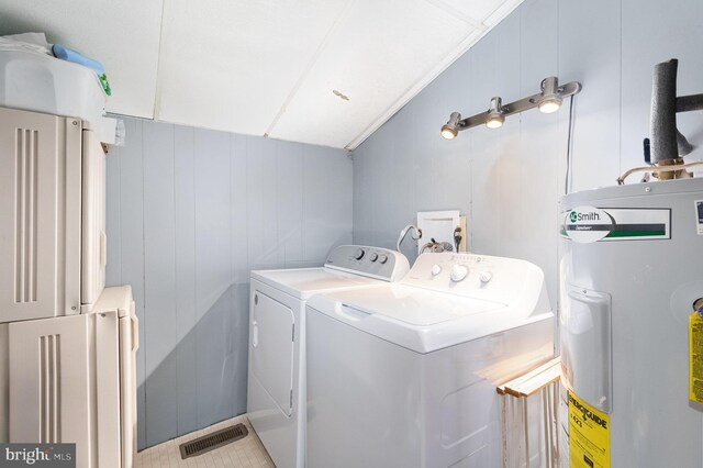 1214 Minnich Rd, Mechanicsburg, PA 17055 - laundry room with water heater and washing machine and dryer
