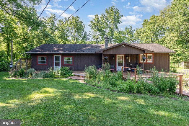 1214 Minnich Rd, Mechanicsburg, PA 17055 - view of front of house with a front lawn, a chimney, and roof with shingles